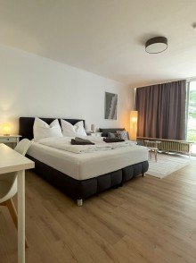 Schlafbereich Moderne 1-Zi-Wohnung in der Waldstra�e